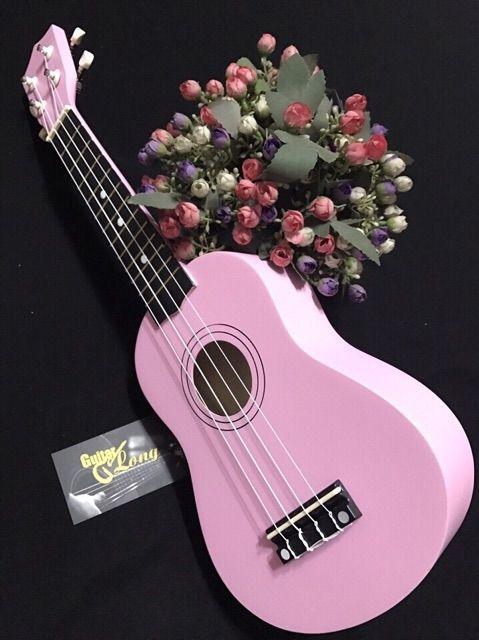 Đàn ukulele soprano màu hồng+bao đàn+pick gảy+sách hướng dẫn+dây sơ cua số 1. Bảo đảm y hình 100%
