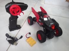 Xe điều khiển từ xa địa hình con nhộng có đèn pha trước sau, có pin sạc, tay cầm xoay cá tính