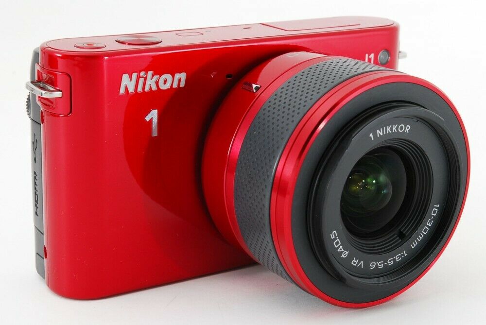 [HCM]Máy ảnh Nikon J1 + lens 10-30mm F3.5-5.6 Vr - Quay Full HD 60i - Đẹp 95%