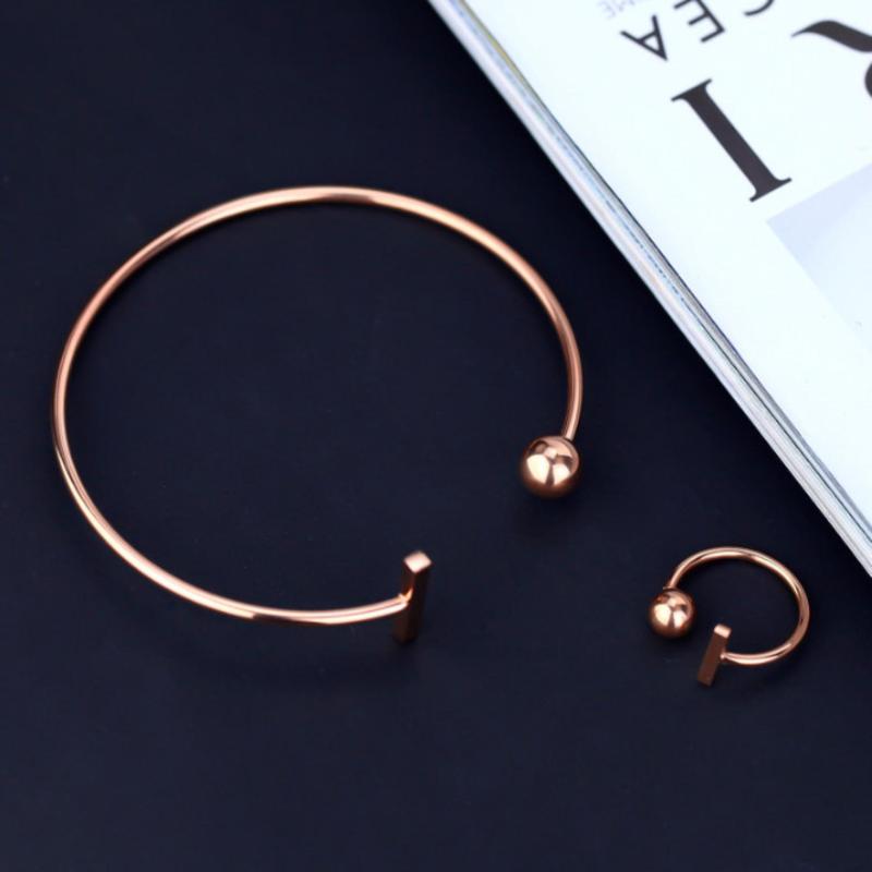 Bộ Trang Sức Nhẫn Và Vòng Tay Titan Ko đen TT 0371